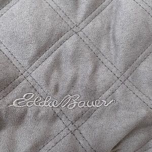 Warm and cozy neutral car seat cover.